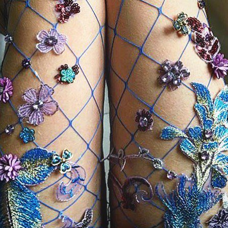 Lirika Matoshi's jeweled fishnet stockings - The Chic Flâneuse