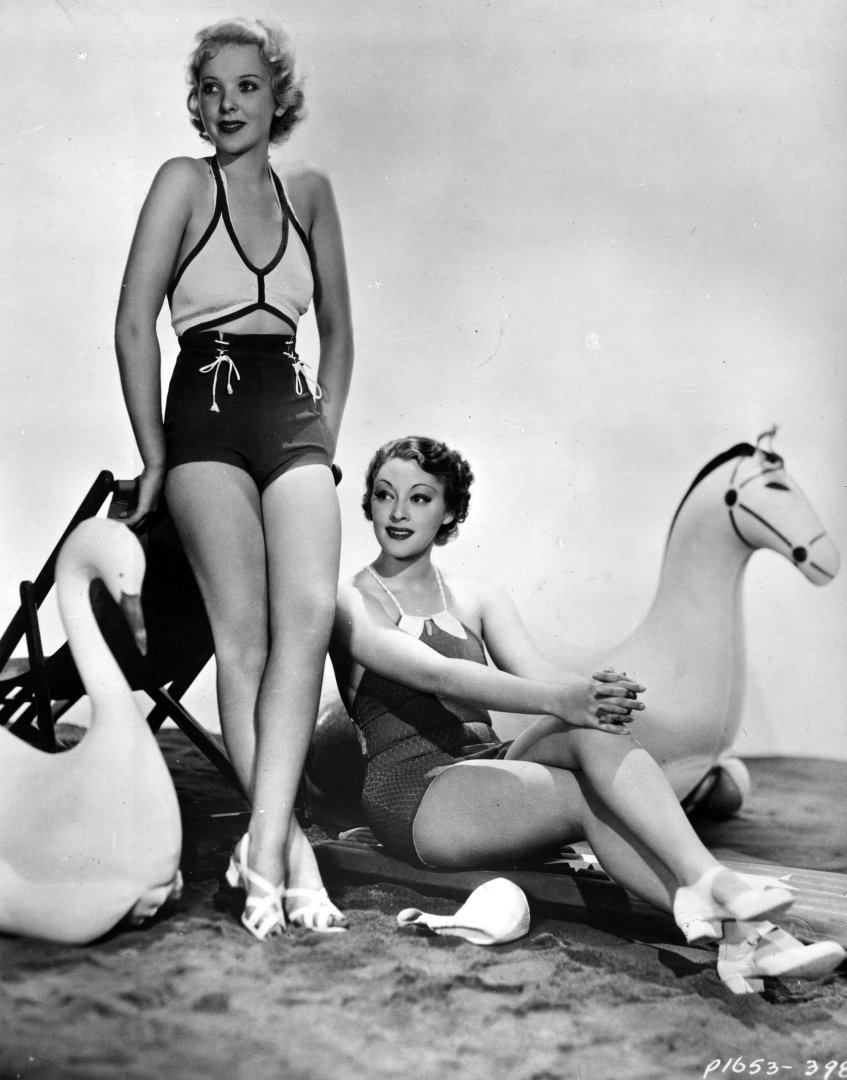circa 1935: Actresses Ida Lupino (1918 - 1995), and Kathleen Burke (1913 - 1980), model the latest swimwear. (Photo by Keystone/Getty Images) - thechicflaneuse