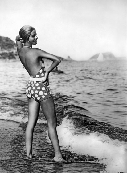 Alice Nikitina, well known Russian ballet dancer, teacher, and opera singer wearing one of her striking bathing suits at the beach in Italy, Alassio, Italy, circa 1929. Some called it a 'bizarre bathing suit'. (Photo by Underwood Archives/Getty Images)- thechicflaneuse