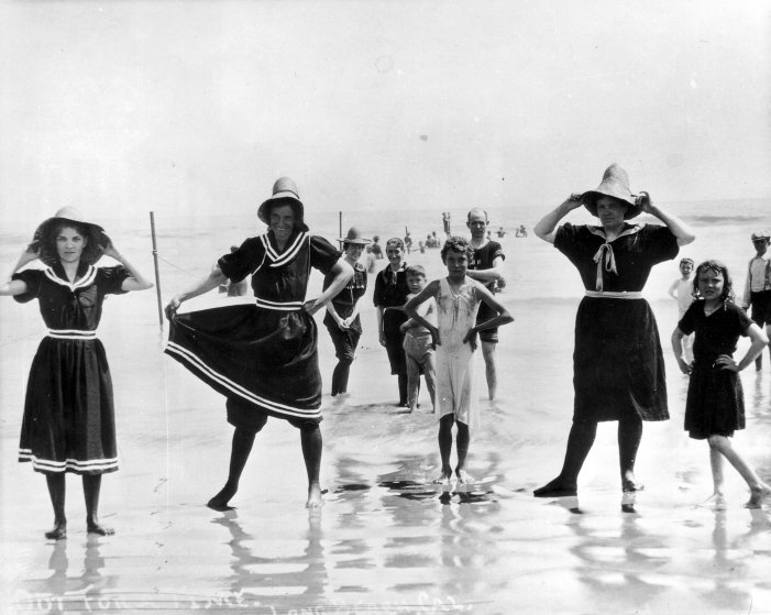 circa 1890: Holidaymakers posing in bathing suits in the ocean surf at Santa Monica, California. (Photo by American Stock/Getty Images) - the chicflaneuse