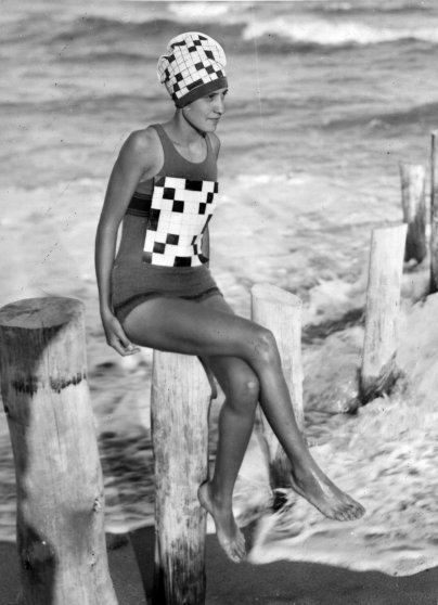 circa 1933: Verna Lee Fisher sporting her newly created crossword swimsuit with matching bathing hat, at Palm Beach, Florida. (Photo by General Photographic Agency/Getty Images)-thechicflaneuse