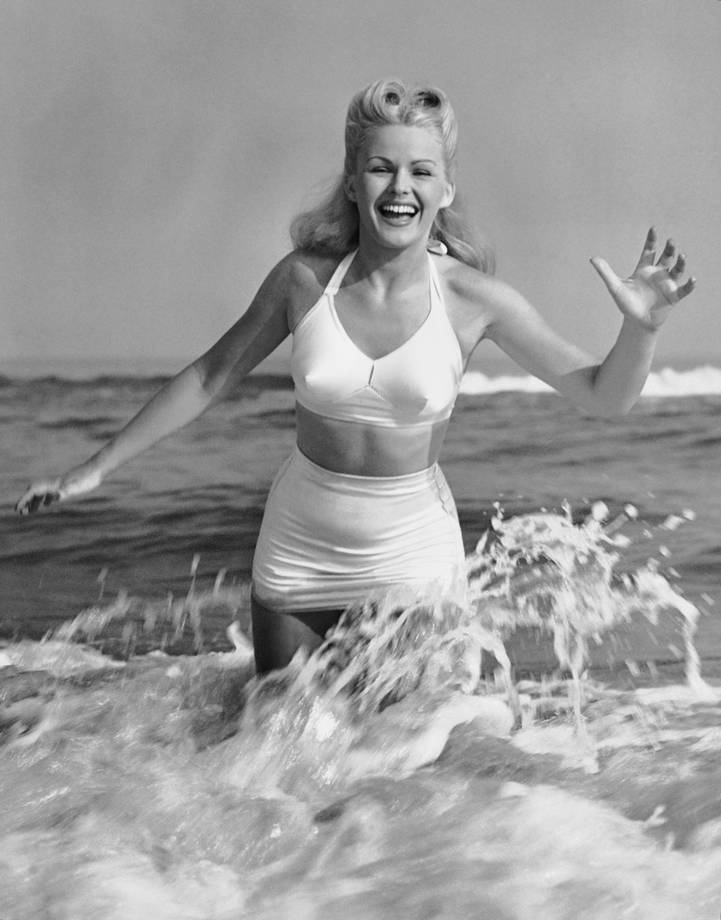 UNITED STATES - CIRCA 1950s: Blonde woman in two piece bathing suit. (Photo by George Marks/Retrofile/Getty Images) - thechicflaneuse
