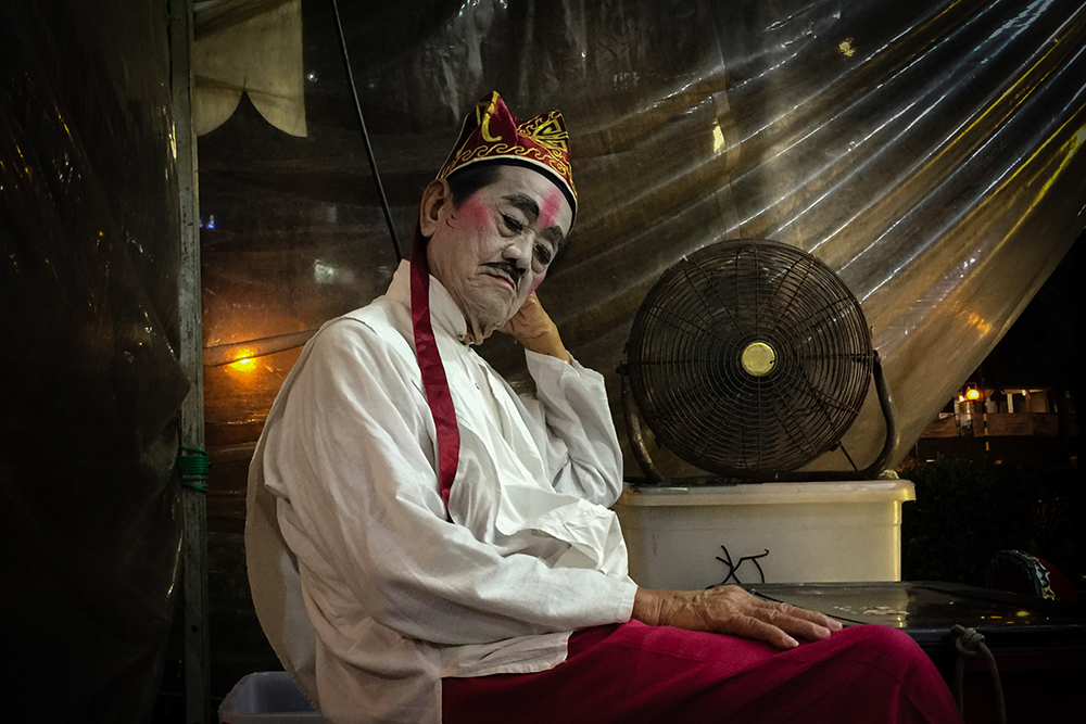 Yeow-Kwang Yeo Singapore 2nd Place, Photographer of the Year iPhone 6 Plus The Performer “Chines traditional street opera is part of the Chinese culture. Unfortunately, the young generation in Singapore is no longer interested. Hence the street opera is fast disappearing. Instead of shooting their performance, I decided to go the back of the stage to capture the performers’ preparation activity. I spotted this experience performer who is taking a short rest and was waiting for his turn to perform. I was attracted by the lighting of the old plastic curtain, electric fan, and the overall calm atmosphere.”