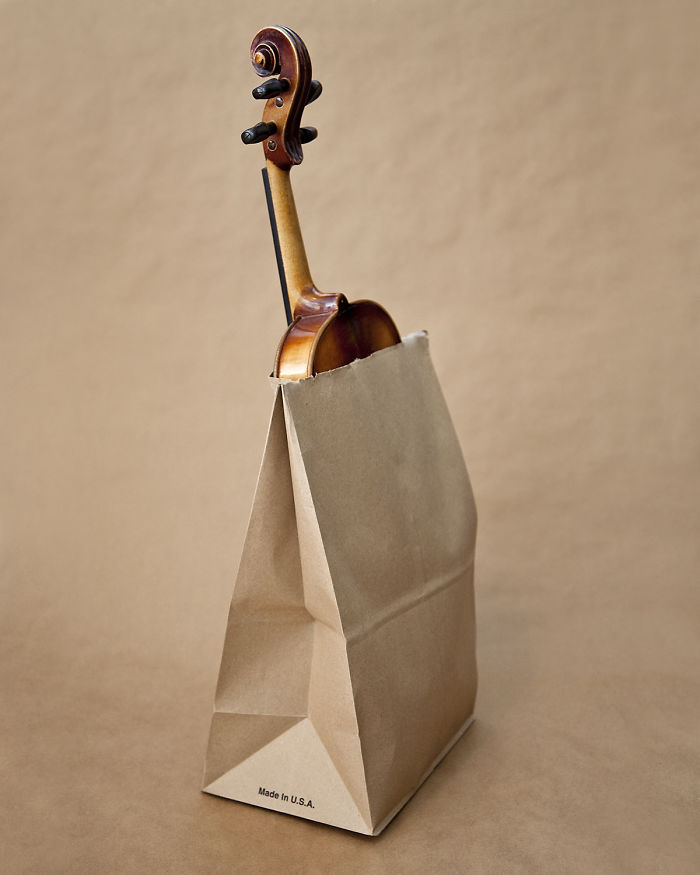 Olivia Locher I-fought-the-law-Utah violin in a brown bag