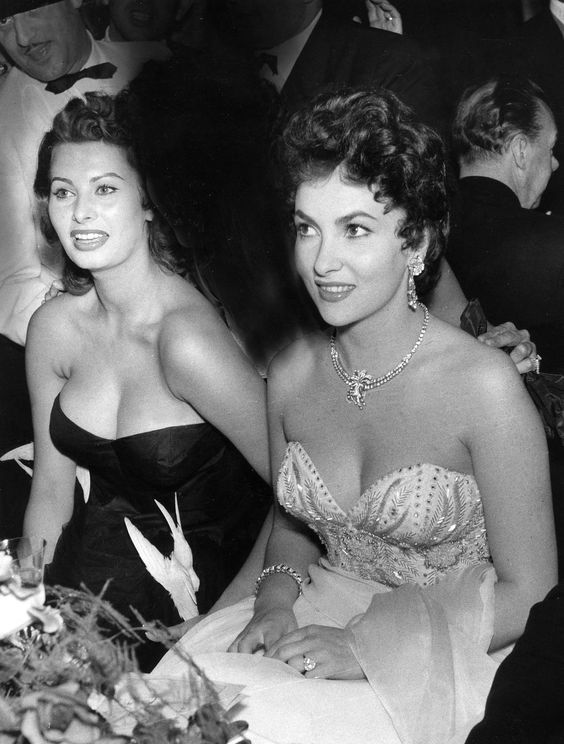 Sophia Loren and Gina Lollobrigida at a film ball in Berlin, 1954.