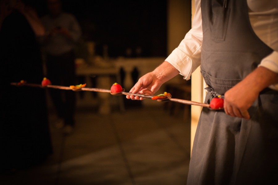 Team of chef David Kinch (Manresa) serving “Petit Farcis” Pepper and Tomato on a sculptured walnut spoon by Julian Watts.