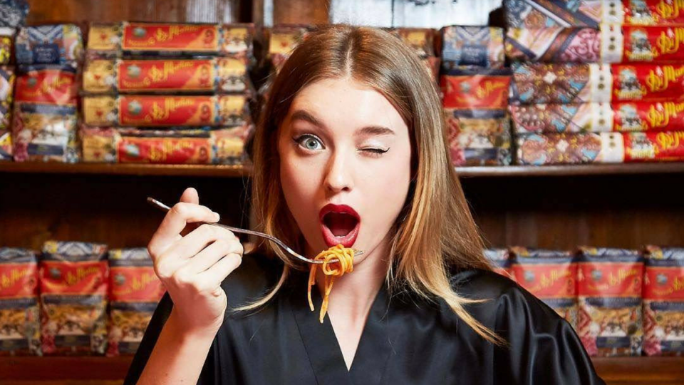 model eating pasta dolce gabbana